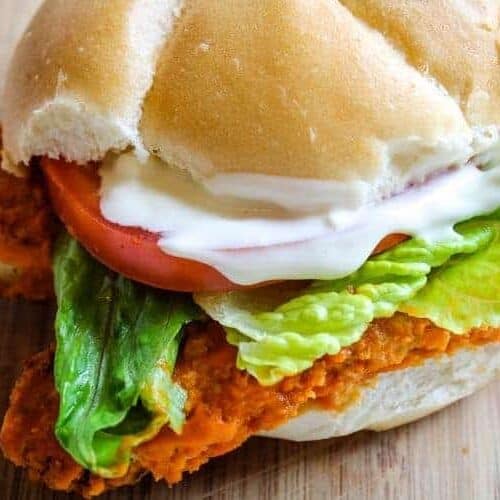 Buffalo Chicken Sandwich on a wooden cutting board