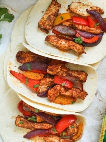 air fryer chicken fajitas inside flour tortillas