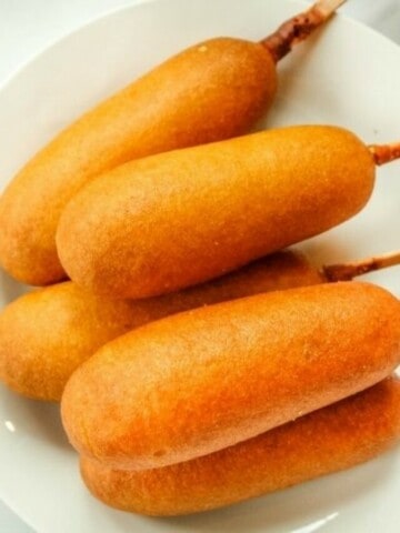 Air Fryer Corn Dogs on a white plate