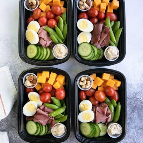 Protein snack packs in meal prep containers for lunch.