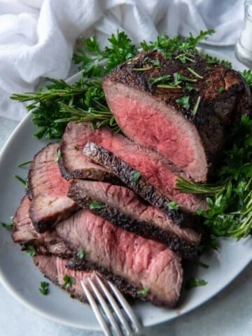 Roast beef on a serving platter sliced