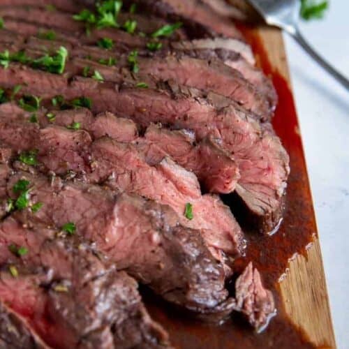 Tender and juicy air fryer flank steak with sauce