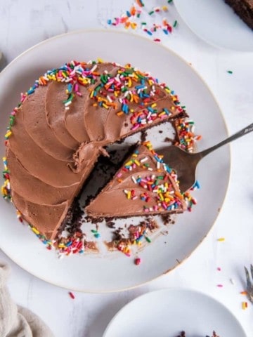 serving a slice of chocolate cake made in air fryer