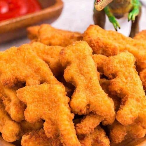 Pile of crispy dino nuggets on a plate