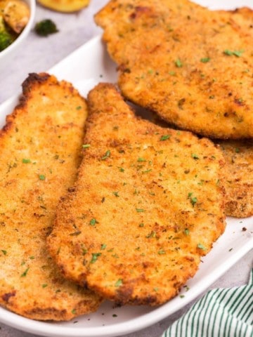 crispy chicken cutlets on plate