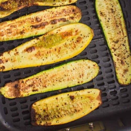 slices of squash placed in air fryer