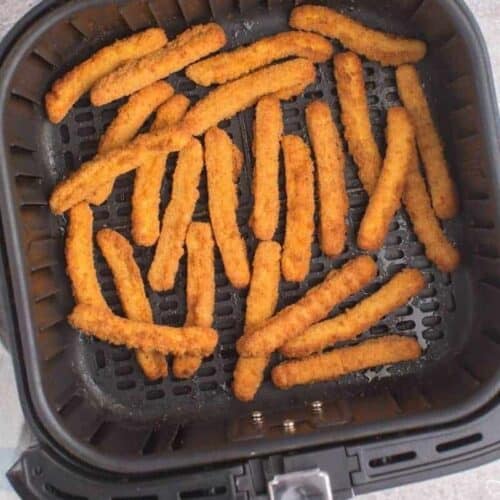 cook chicken fries thoroughly by shaking basket