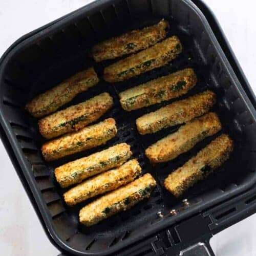 air fryer basket with zucchini fries