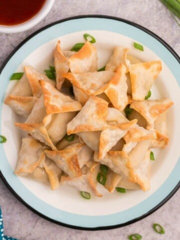 plate with a mound of crab rangoon