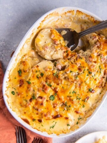 scooping scalloped potatoes