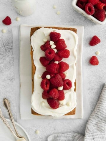 loaf cake with fresh raspberries