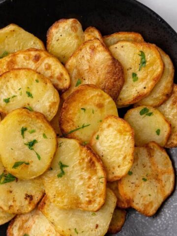 closeup of air fryer sliced potatoes