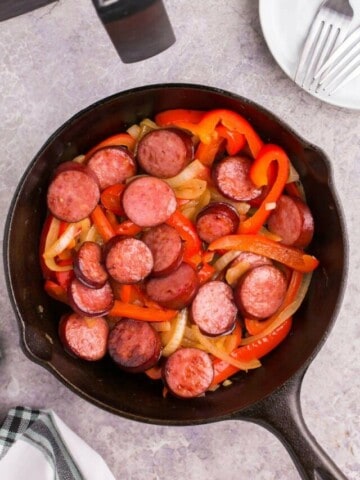 eating air fryer kielbasa with sauteed bell peppers.