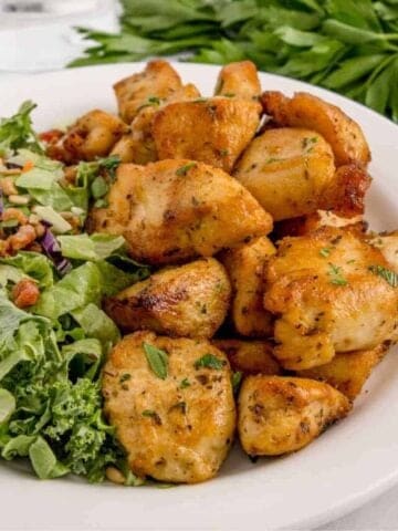 air fried chicken bites with a side salad