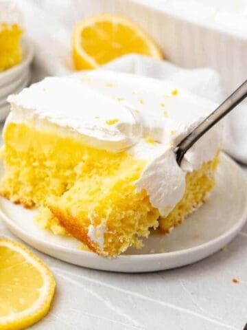 taking a bite out of lemon jello cake with a fork