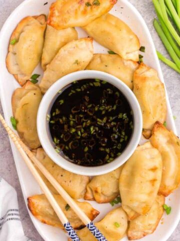 overhead shot of potsticker with soy vinegar sauce