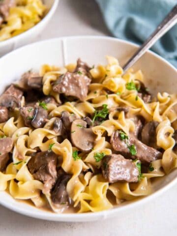 Closeup of cooked beef stroganoff in a bowl