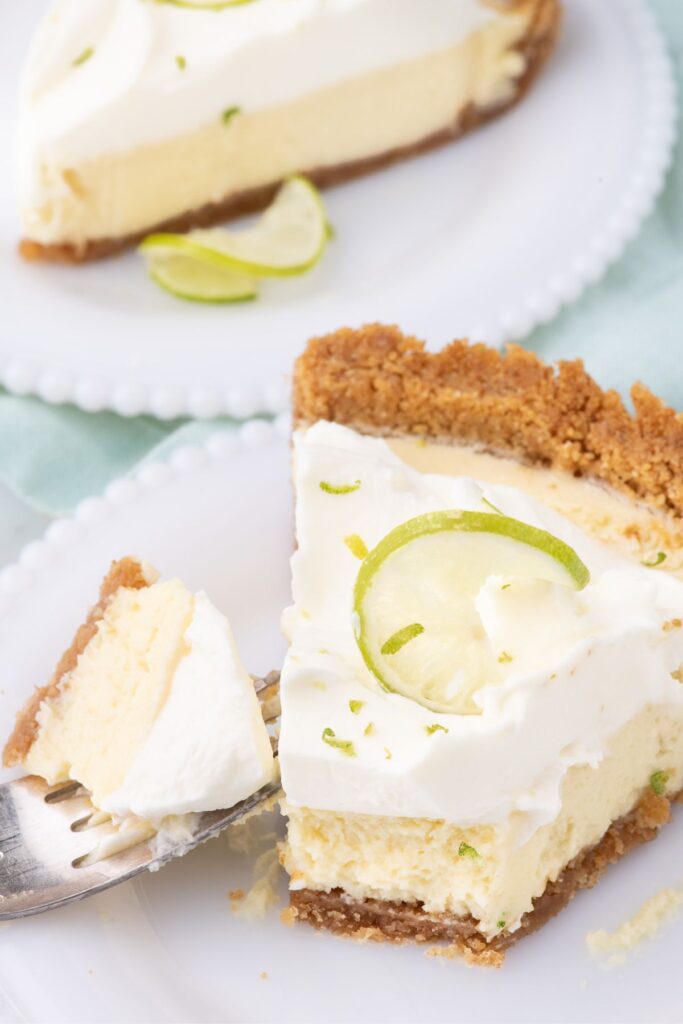 taking a bite out of key lime pie with a fork