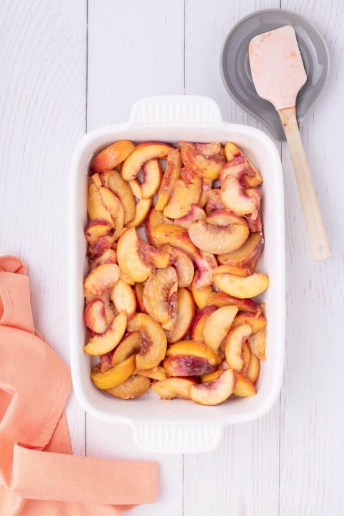 add peach slices to baking dish and pat dry 