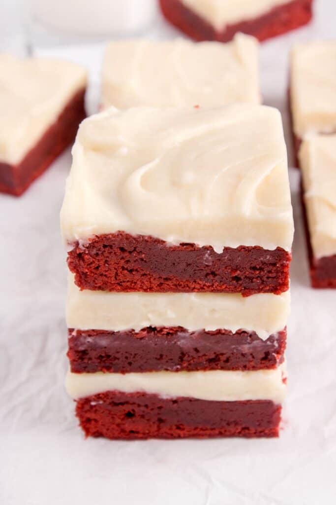 stacked red velvet brownies on a plate