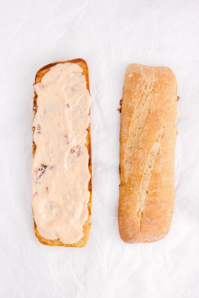 sliced toasted baguette with chipotle mayo spread