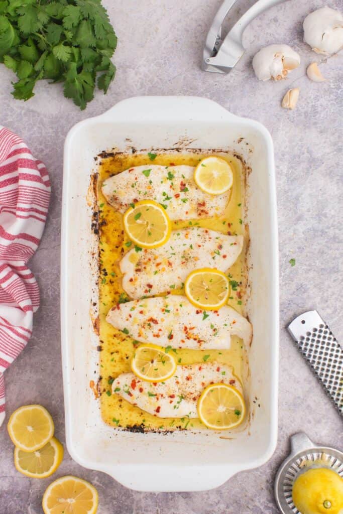oven baked tilapia with butter and lemon slices