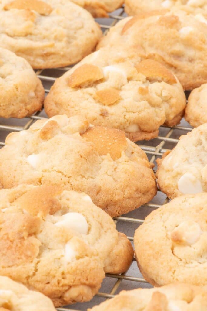 fresh banana pudding cookies on a wire rack