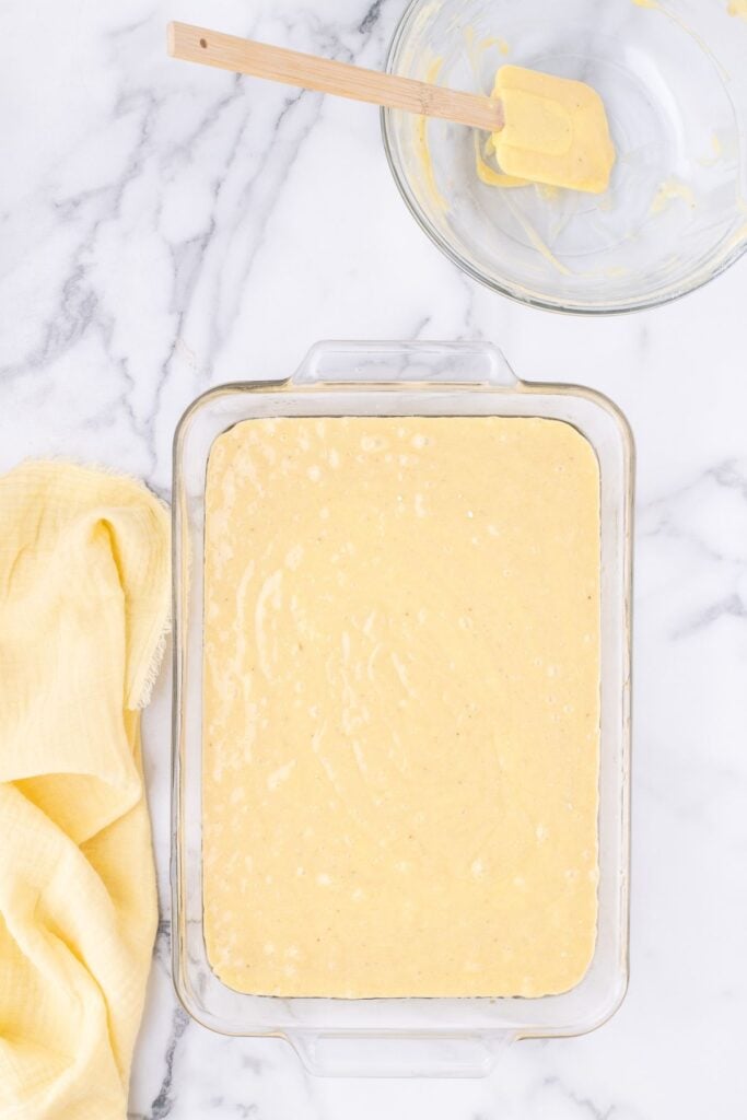 Banana pudding cake in a 13 x 9 pan uncooked about to go in the oven.