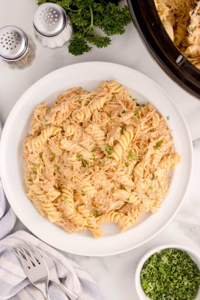 Large serving of Garlic Parmesan Chicken and Pasta on a white plate.