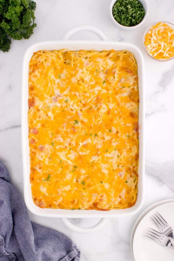 Completed chicken tetrazzini in a white baking dish.