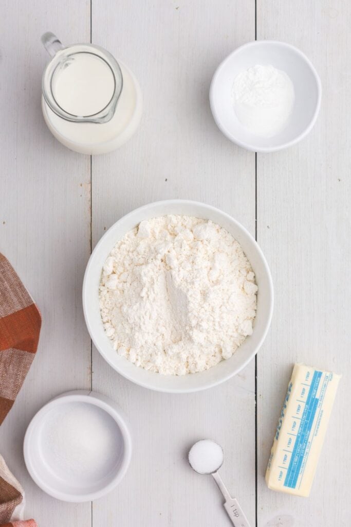 Ingredients for biscuits: flour, baking powder, salt, sugar, butter, and milk.