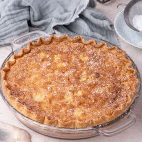 Completed chess pie with a dusting of powdered sugar on top.