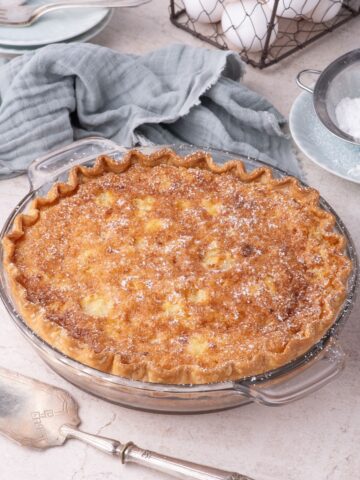 Completed chess pie with a dusting of powdered sugar on top.