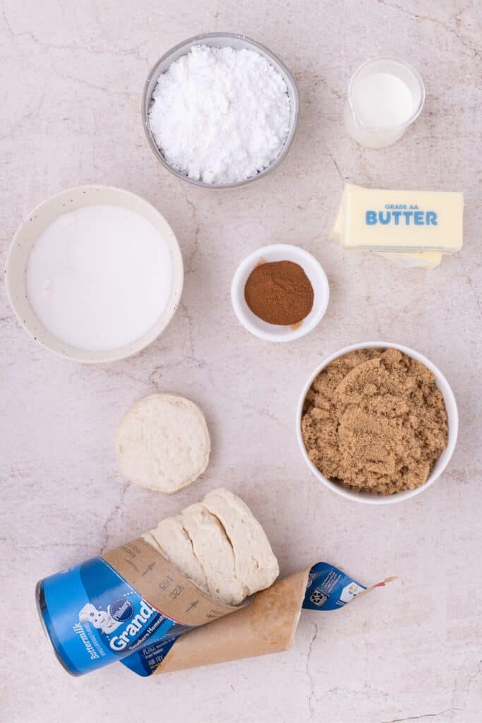 Ingredients for Monkey bread: Milk, Powdered sugar, sugar, cinnamon, brown sugar, butter, and refrigerated biscuits.