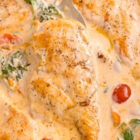 Cooked Tuscan chicken in a skillet.