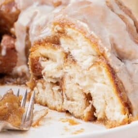 close up of monkey bread with piece cut off the side