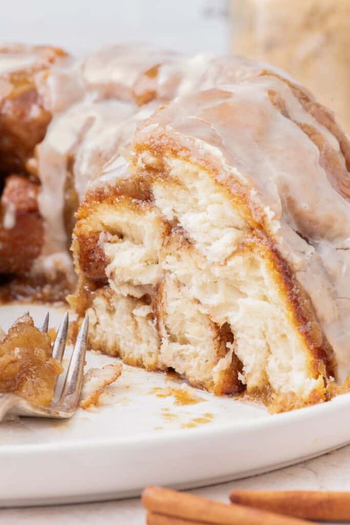 close up of monkey bread with piece cut off the side