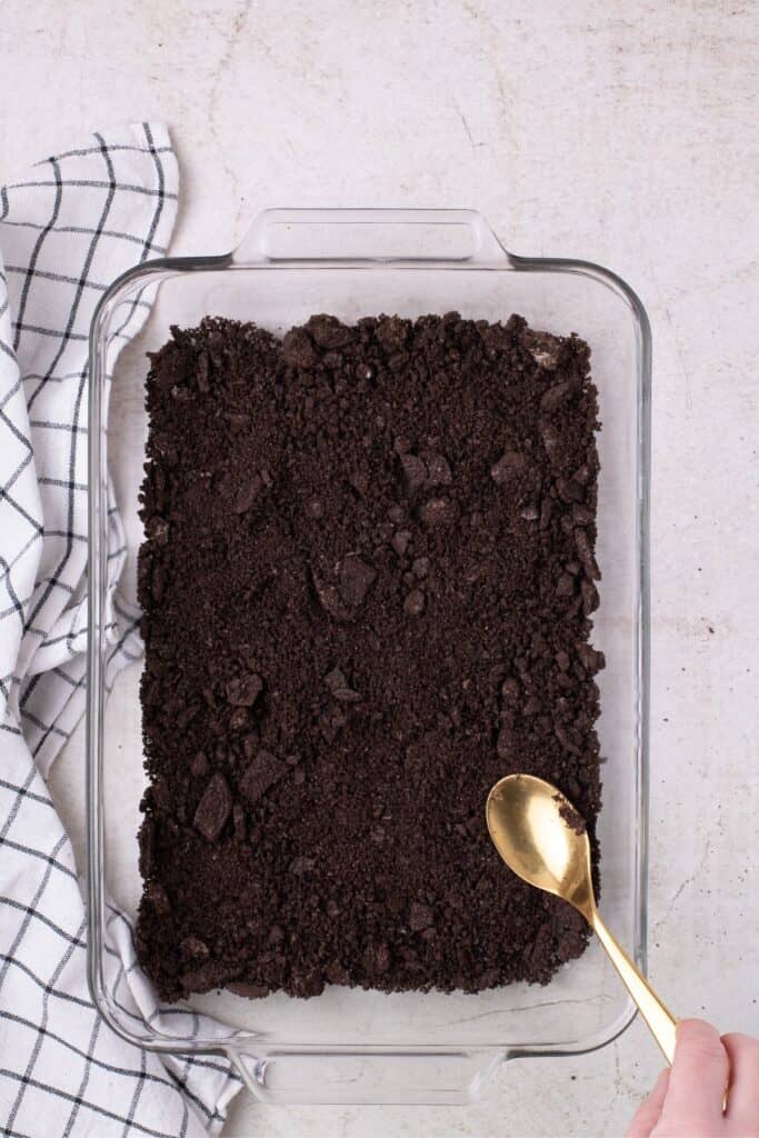 Cookie crust pressed into the bottom of the baking dish.