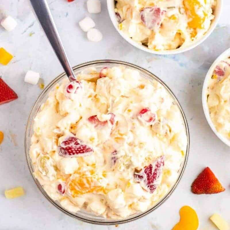 cool whip fruit salad in 3 bowls.