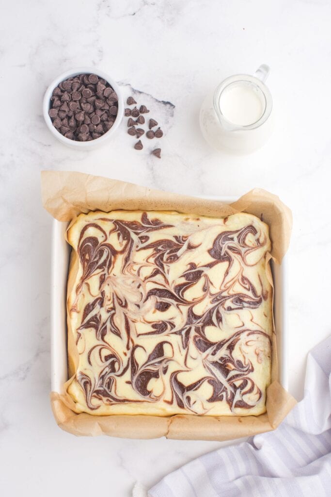 Baked cheesecake brownies in the baking pan.