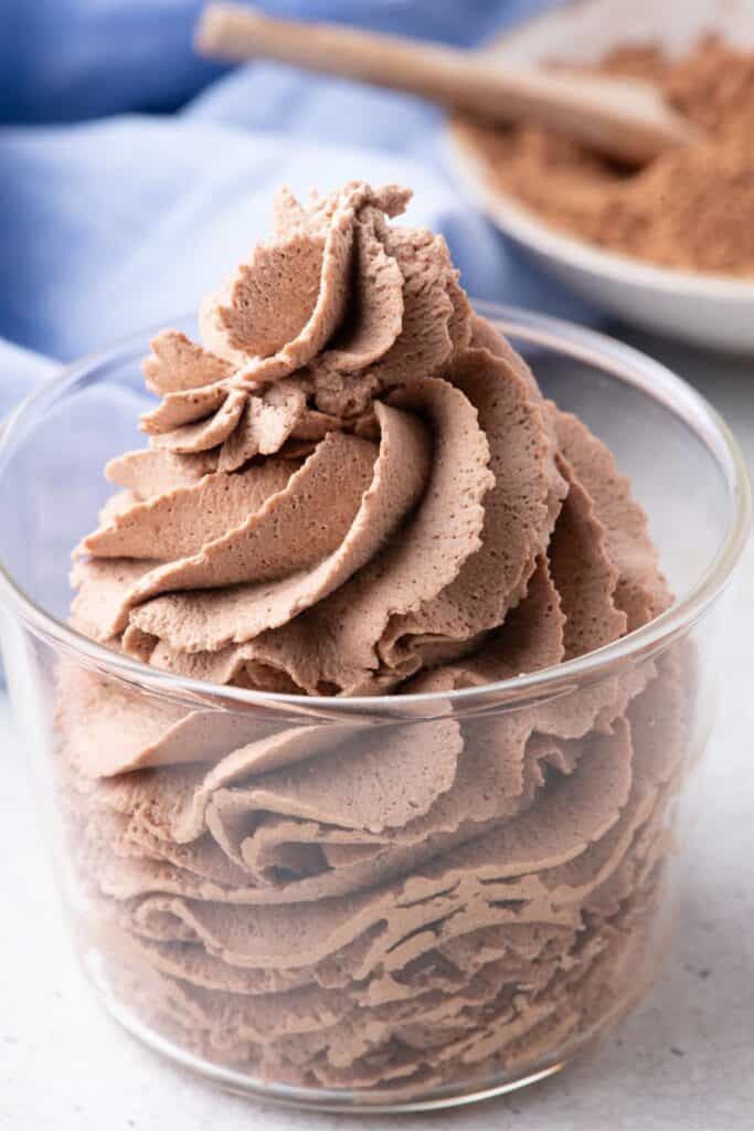 Chocolate whipped cream in a glass bowl.