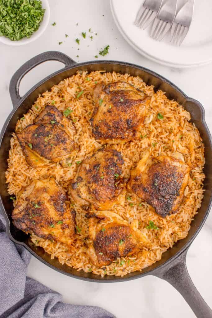 Chicken and rice in cast iron pan.