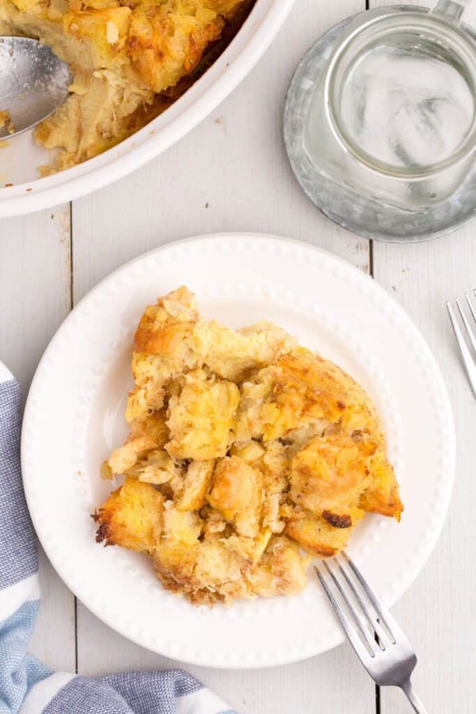 White dinner plate with a serving of pineapple stuffing.